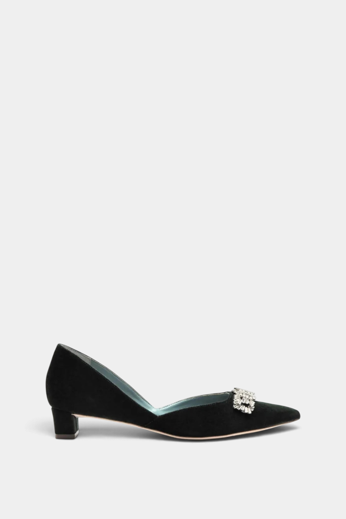 The Copper Shed Paula Mini Block Heel in black velvet with a pointed toe, side cutouts, and a gemstone embellishment.