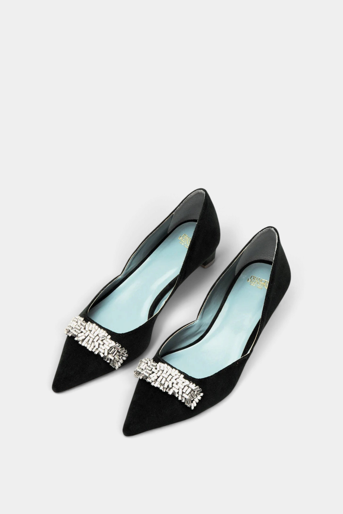 The Copper Shed Paula black velvet d'Orsay pumps with pointed toes, gemstone embellishments, and mini block heels.