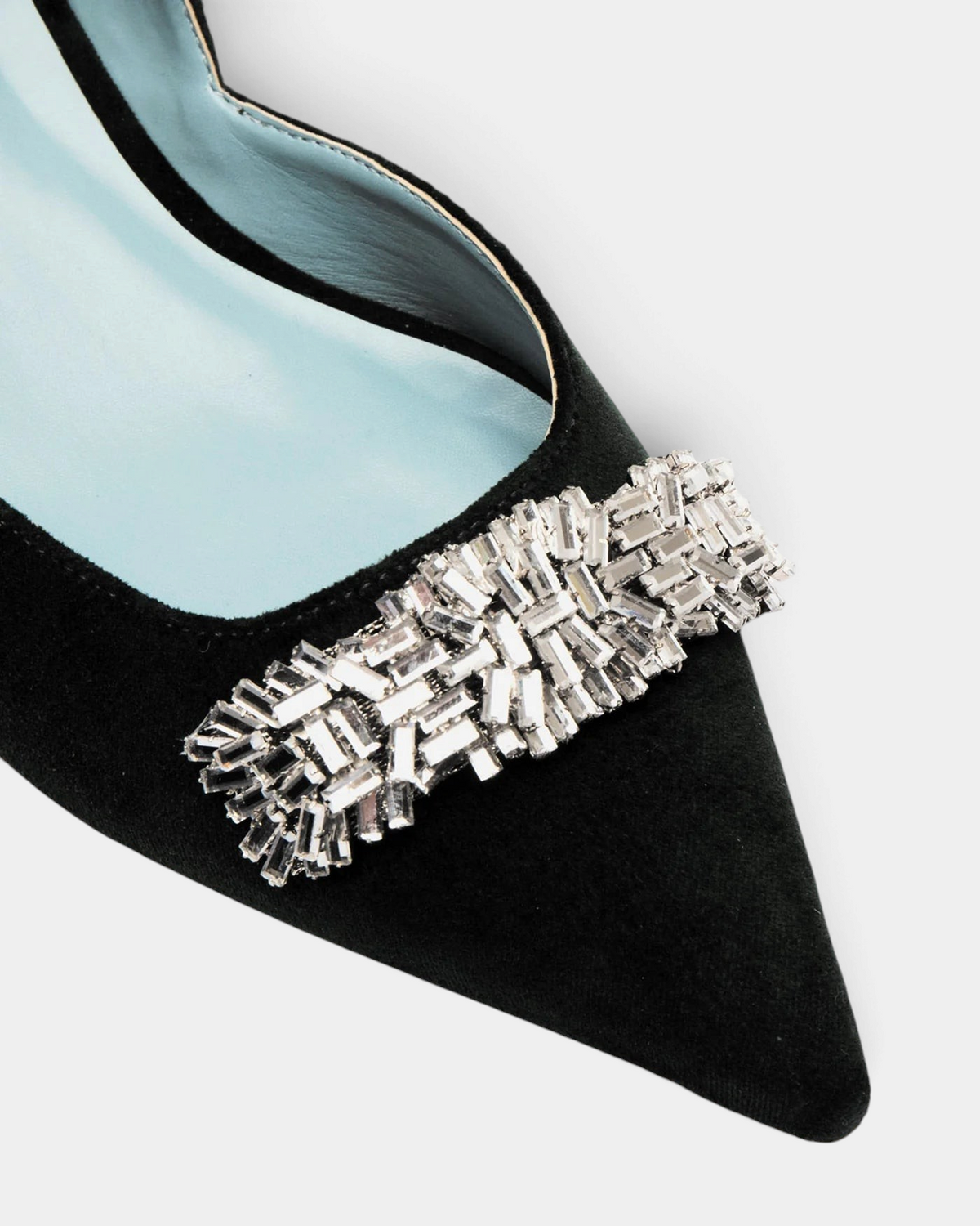 The Copper Shed Paula Mini Block Heel in black velvet with a pointed toe and sparkling gemstone embellishment.