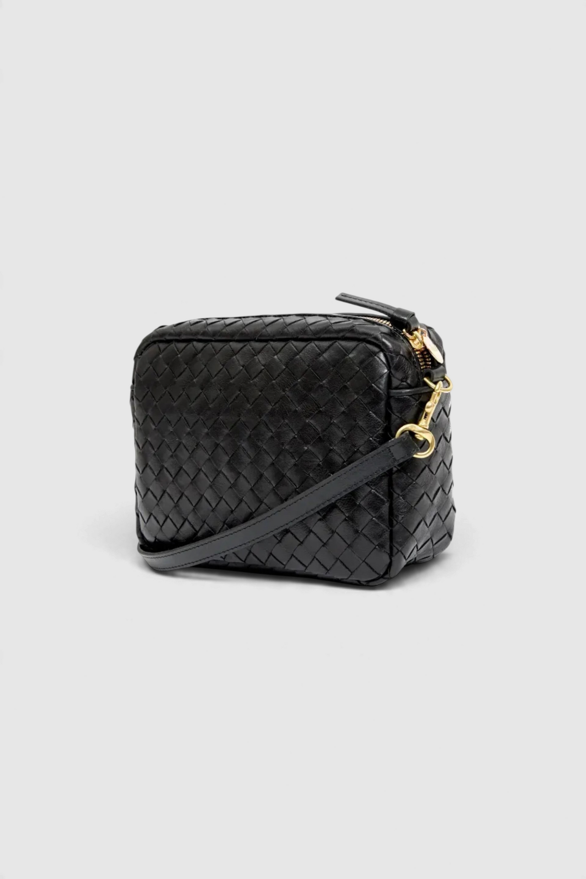 The Copper Shed black handwoven leather Woven Checker Midi Sac crossbody bag with gold hardware and adjustable strap