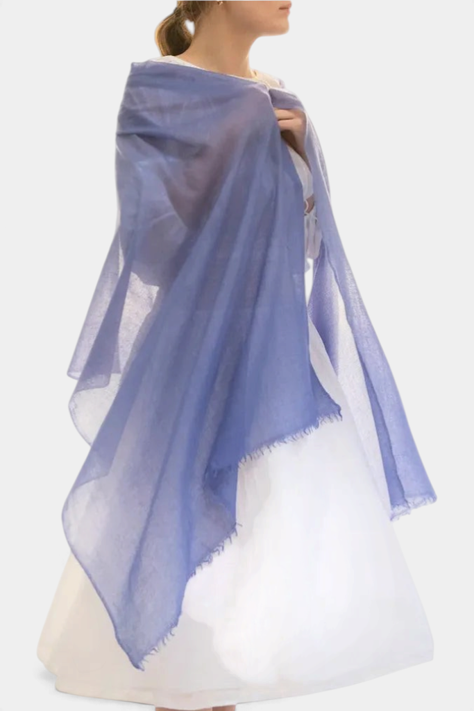 The Copper Shed featherweight blue cashmere stole scarf draped elegantly over a model's shoulders