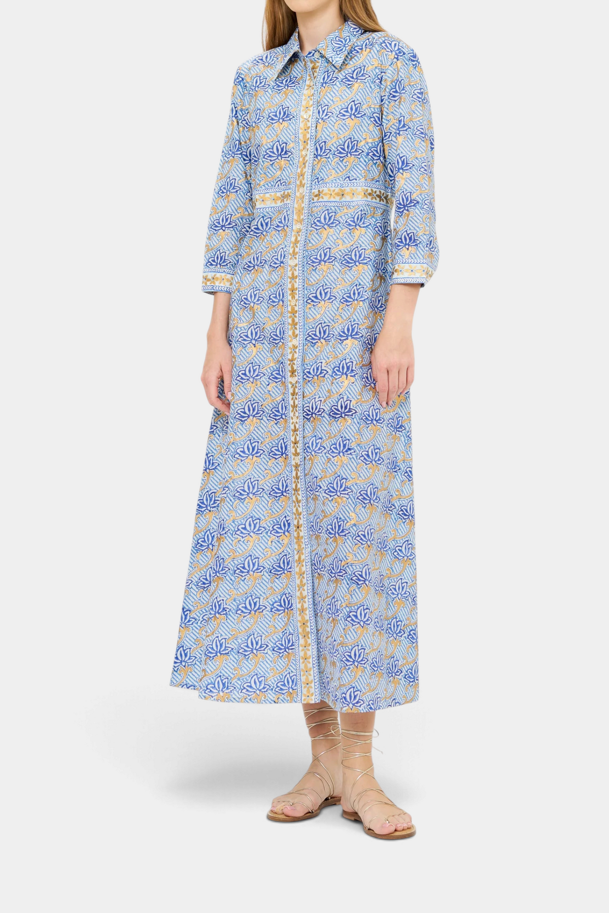 The Copper Shed maxi shirt dress in blue cotton voile with hand-block printed acanthus motifs and gold painted accents.