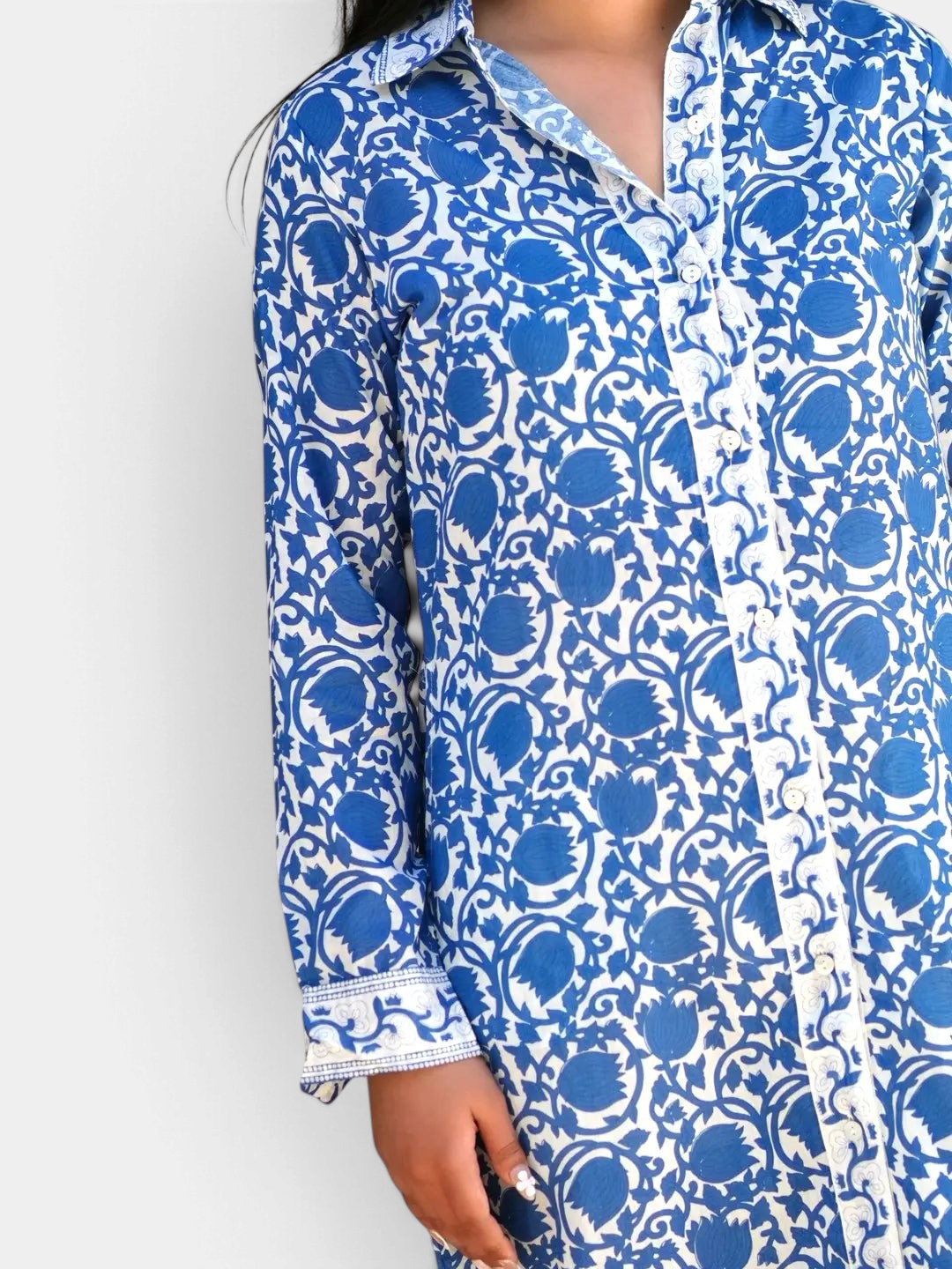 The Copper Shed Adriana shirt dress in blue and white floral print cotton with long sleeves and button-down front
