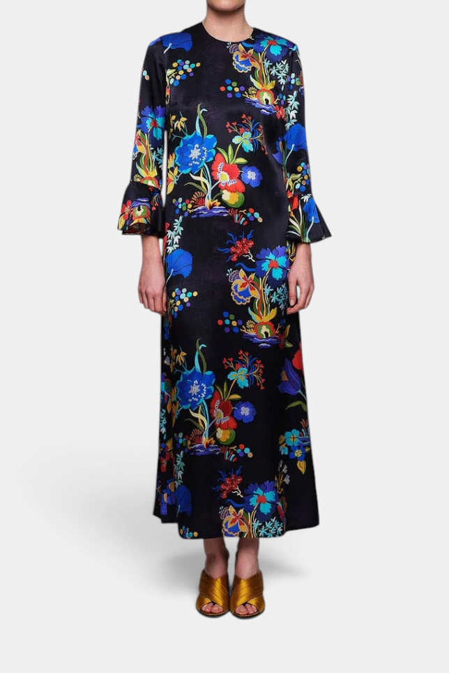 The Copper Shed blue floral print silk long dress with crew neckline and 3/4 ruffle sleeves on a model