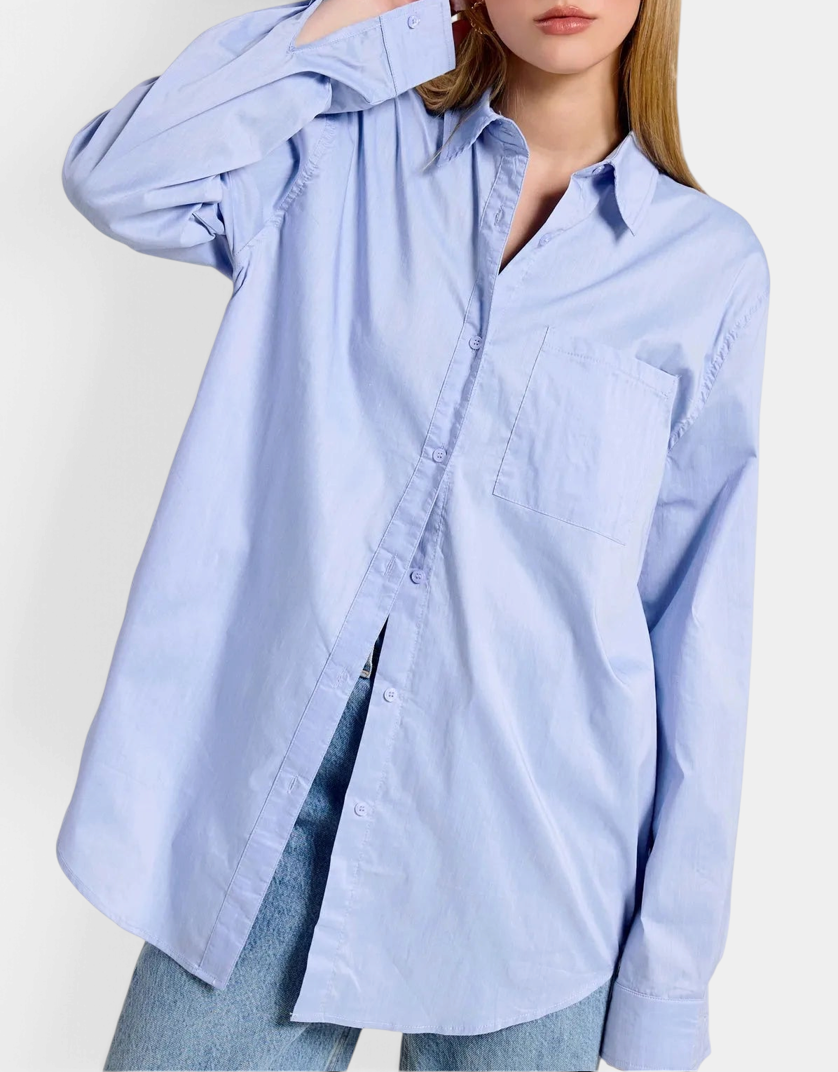 The Copper Shed light blue oversized poplin button-down shirt with a classic collar and front chest pocket.