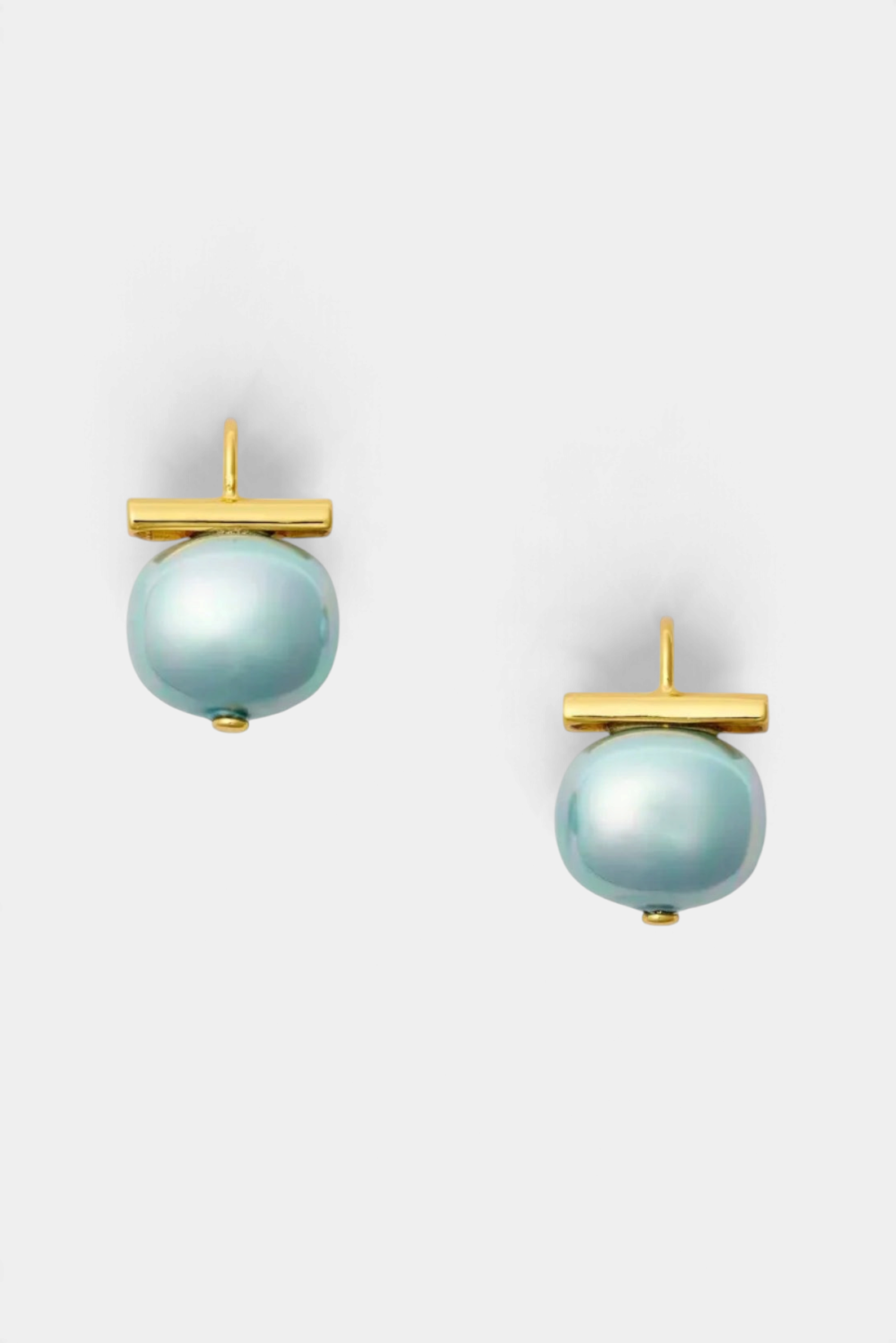 The Copper Shed cornflower blue pebble pearl earrings with 14k gold vermeil T-bar wires on a white background.