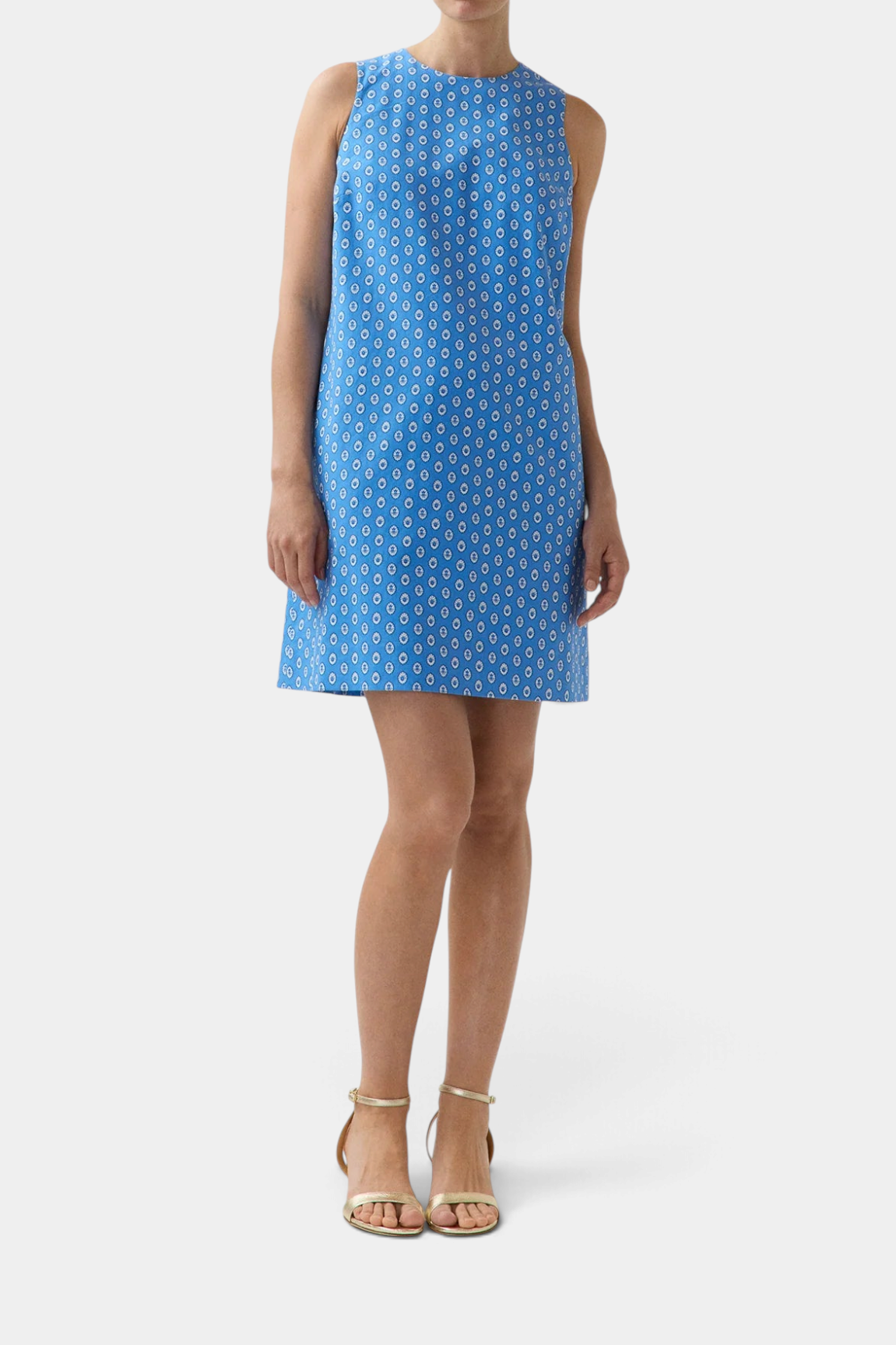 The Copper Shed Susy shift dress in blue cotton poplin with a white geometric print and A-line silhouette.