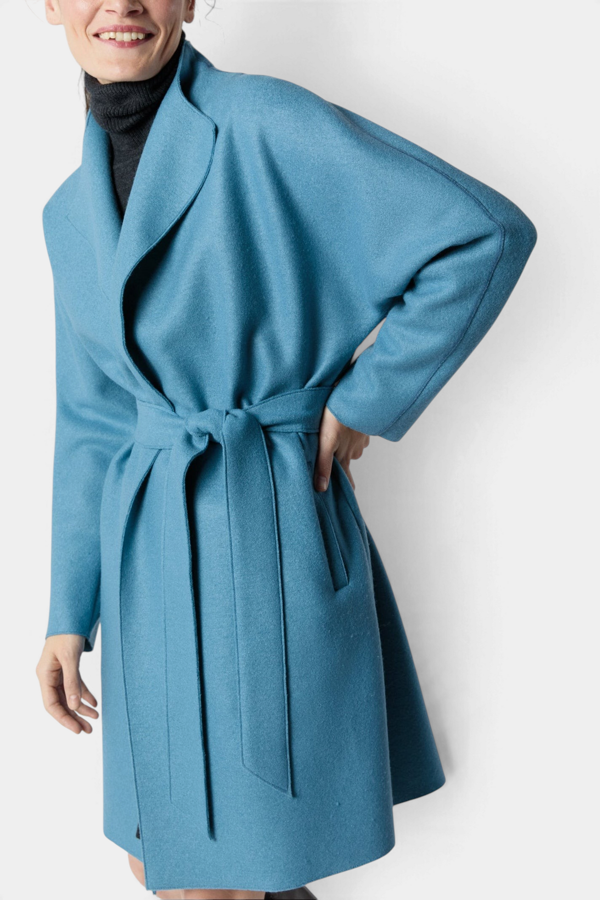 The Copper Shed Kimono Carina wrap coat in blue Italian boiled wool with a waist tie and notched lapels