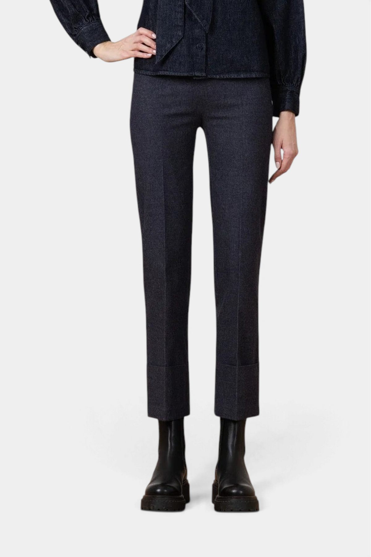 The Copper Shed Bonnie flannel straight-leg pants in charcoal grey with a wide 5-inch cuff, worn with black boots.