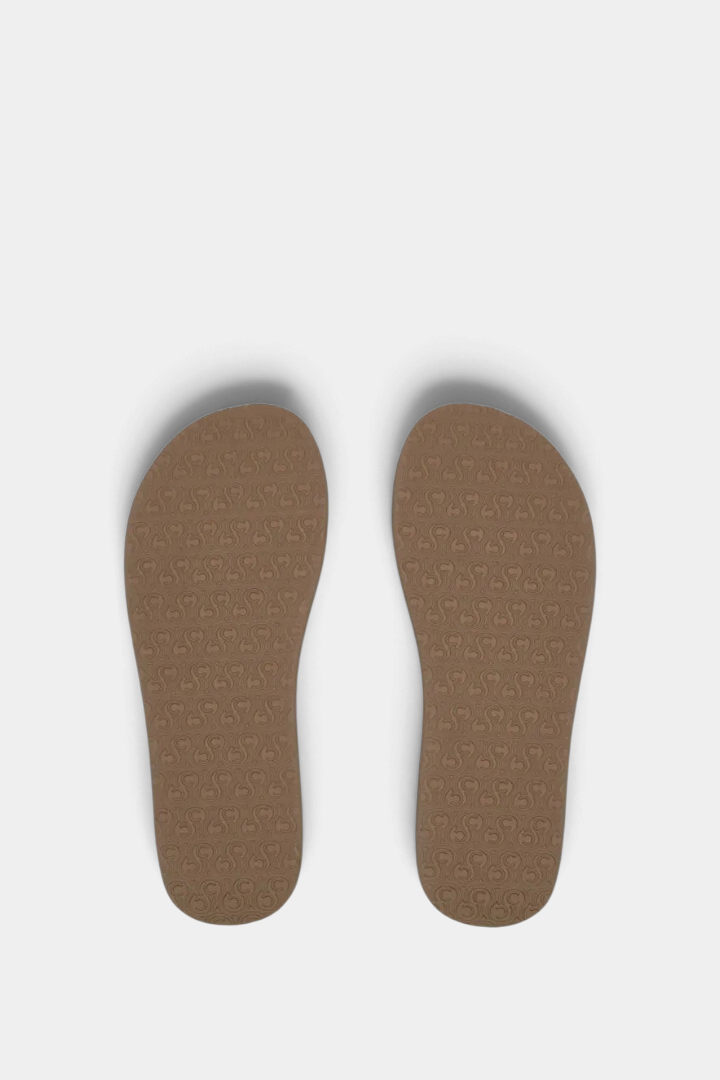 The Copper Shed Braided Pacifica flip flop brown synthetic leather footbed with custom embossed logo pattern