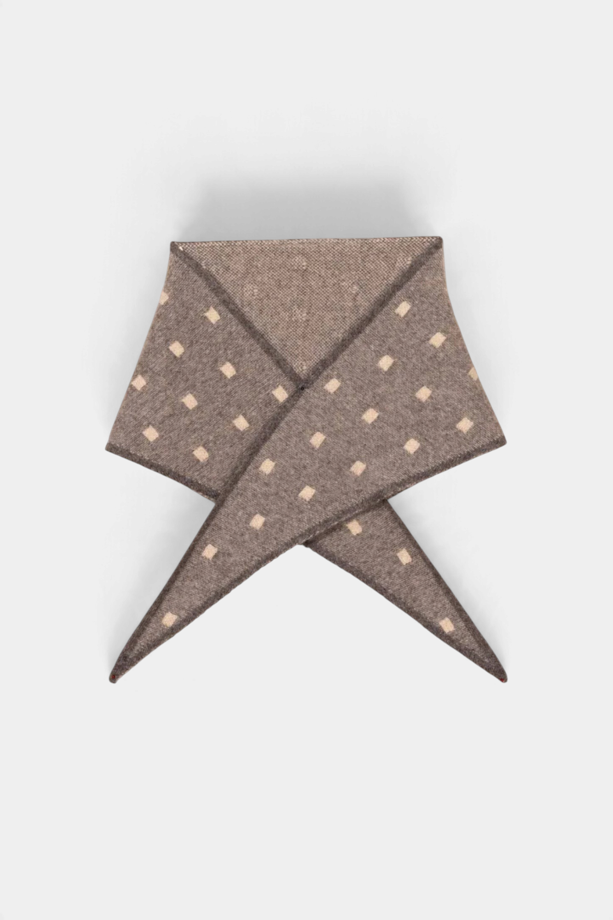 The Copper Shed Mia triangle neckerchief in brown organic cashmere with a subtle cream dot pattern.