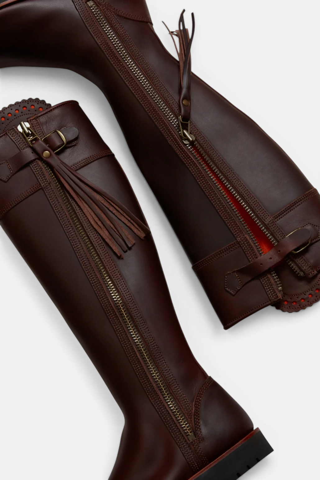 The Copper Shed Standard Tassel Boots in dark brown Spanish leather with side zip, tassel detail, and rubber sole.