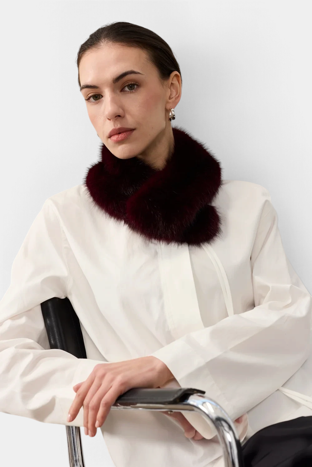 The Copper Shed vintage-style deep burgundy faux fur collar with magnetic fastening worn around the neck.