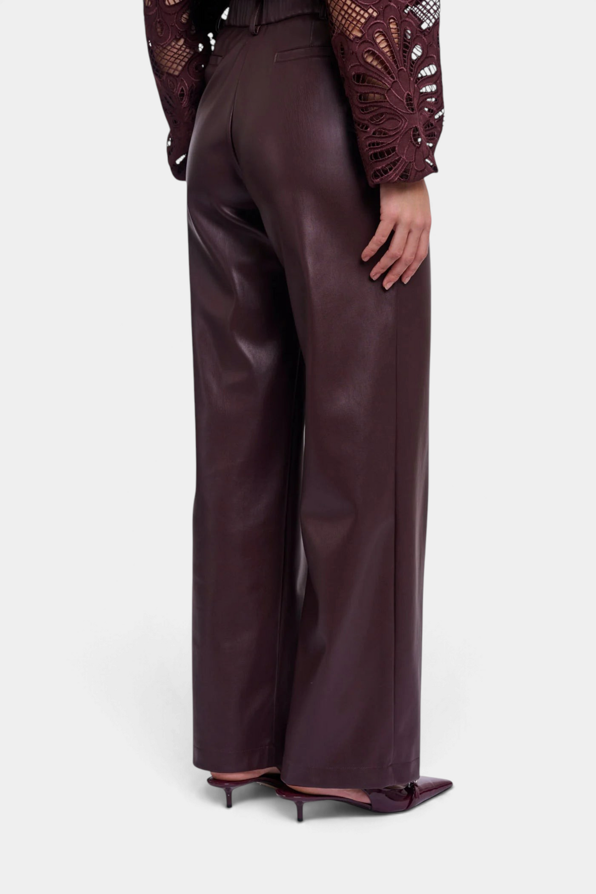 The Copper Shed Georgina straight-leg trousers in dark burgundy faux leather with a comfortable elasticated waistband.