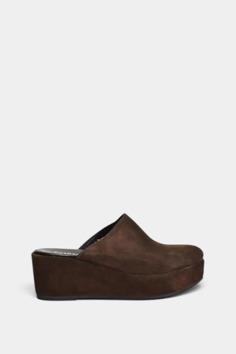 The Copper Shed Camryn dark brown suede slip-in wedge mule with a 2.25-inch heel and comfortable leather footbed.