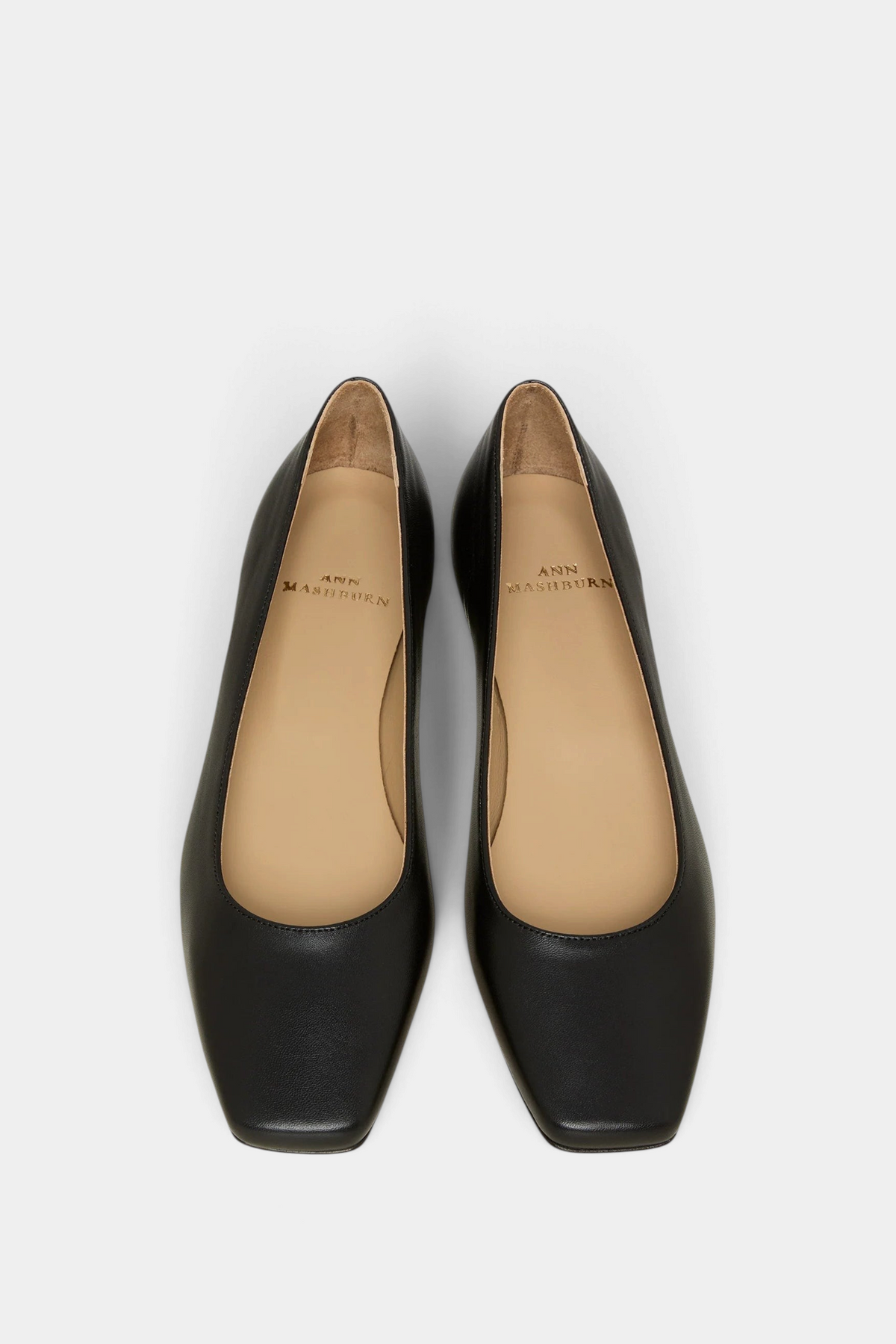 The Copper Shed Cecelia black Italian lambskin demi-flat shoes with a cushioned insole and square toe silhouette.