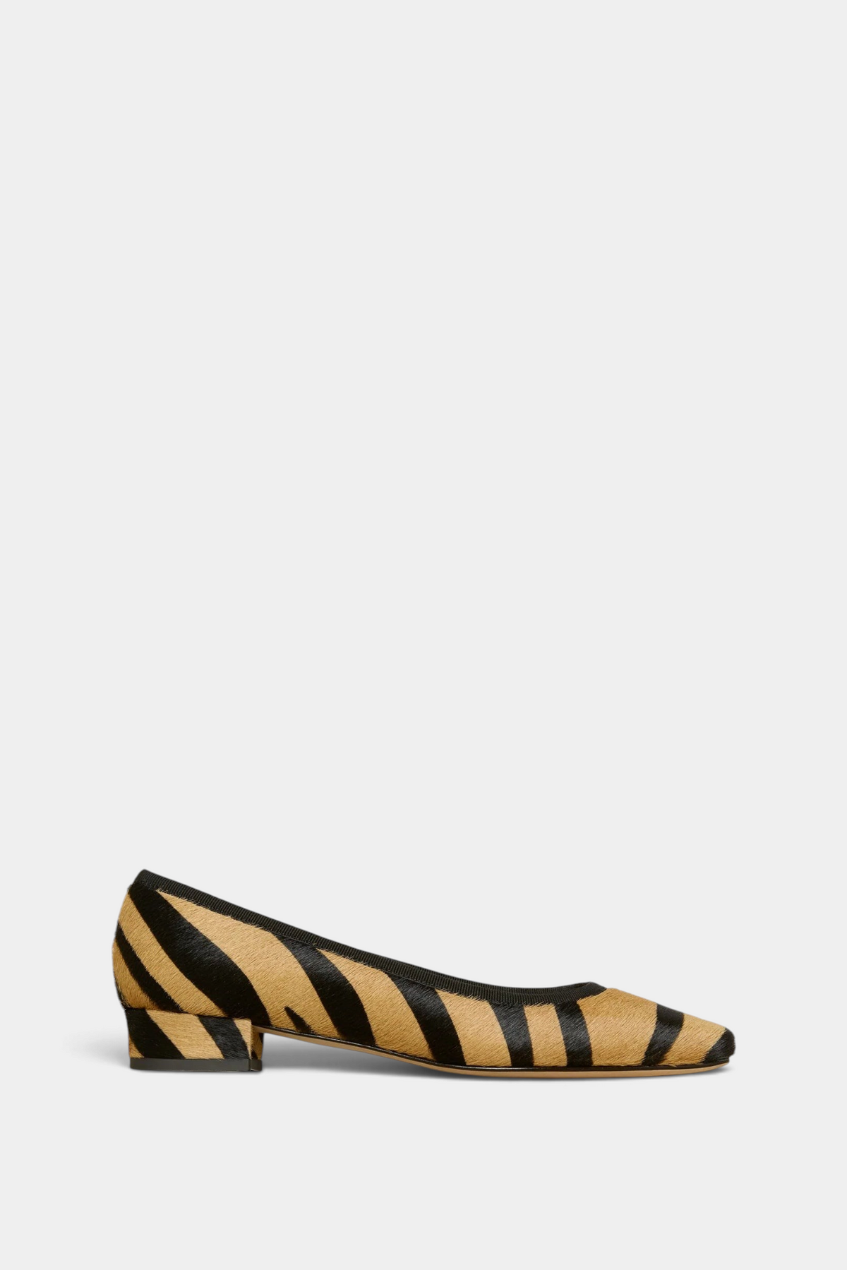 The Copper Shed Cecelia demi-flat in zebra print calf hair with a low covered heel and cushioned leather insole.