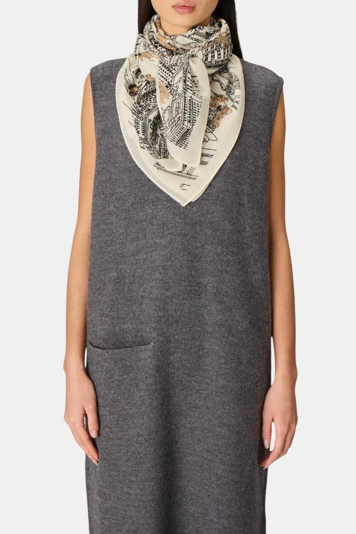 The Copper Shed white square wool scarf with Central Park graphic print worn by a model in a grey sleeveless dress