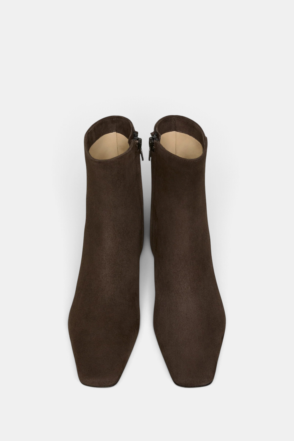 The Copper Shed chocolate brown Italian lamb suede ankle boots with a squared-off toe and side zip closure.