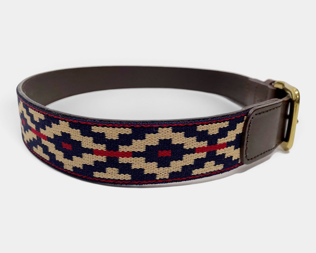 The Copper Shed Cinta Pampa polo belt in navy, tan, and red woven cotton with vegetable tanned leather and brass buckle
