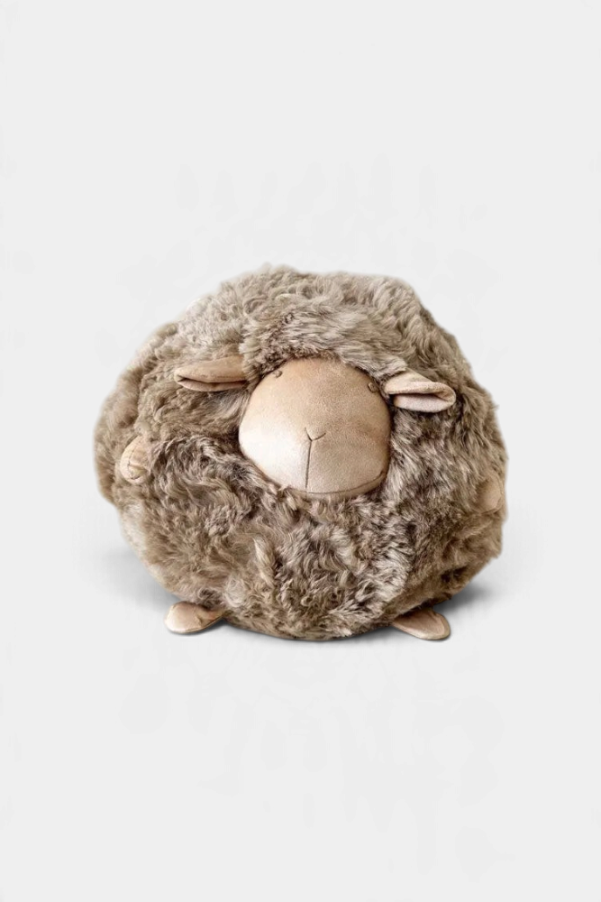 The Copper Shed plush curly sheep made from soft brown Mongolian lambskin with ultra-suede face and feet details.