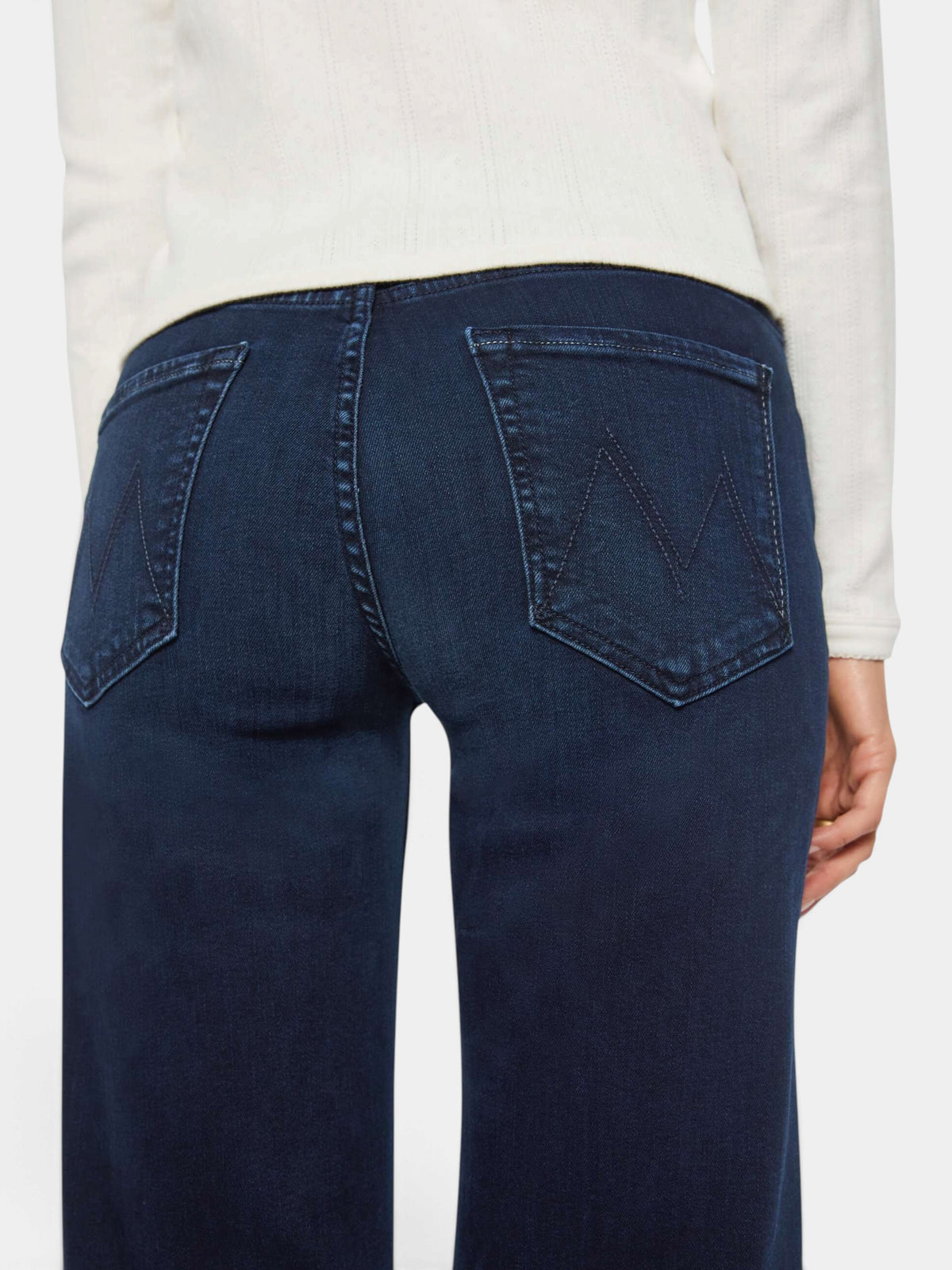 The Copper Shed dark blue stretch denim mid-rise jeans with wide straight leg and back pocket stitching detail