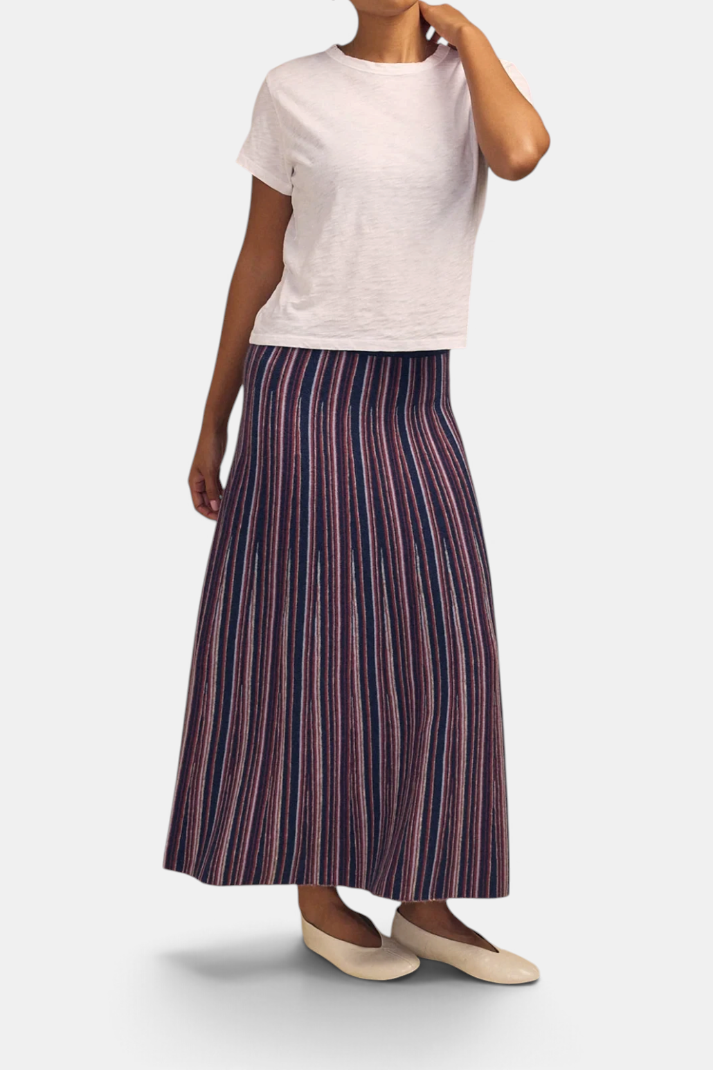 The Copper Shed Desiree08 midi skirt featuring a navy, red, and white vertical striped knit pattern.