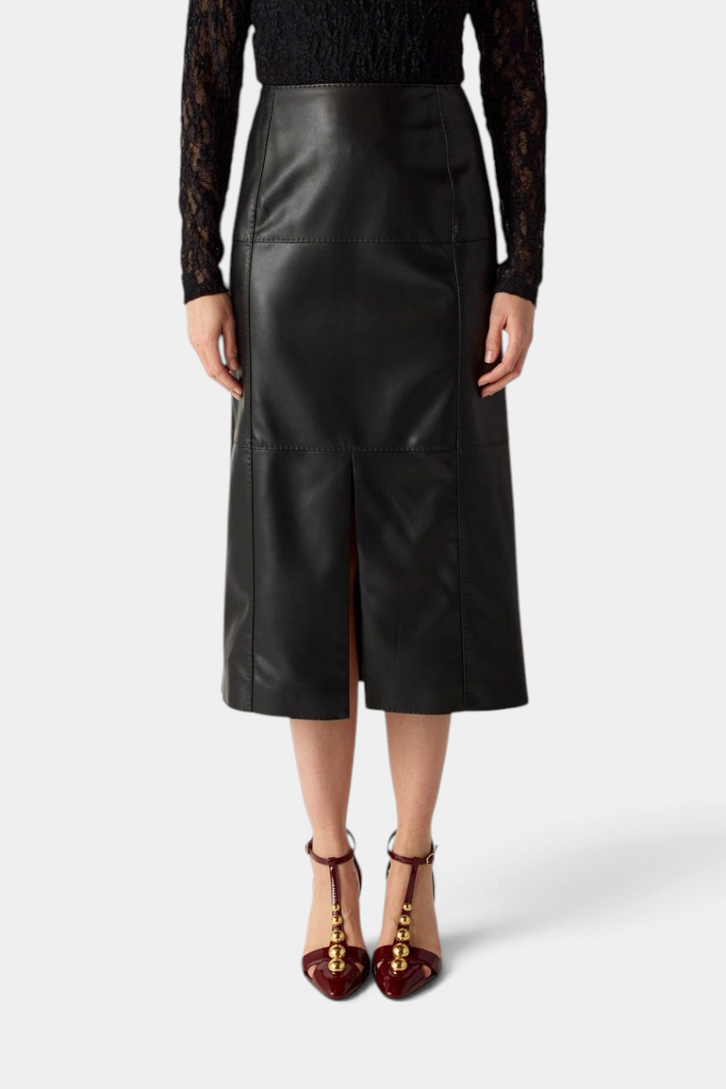The Copper Shed Elliott midi pencil skirt in black vegan leather with pick stitching and a front slit