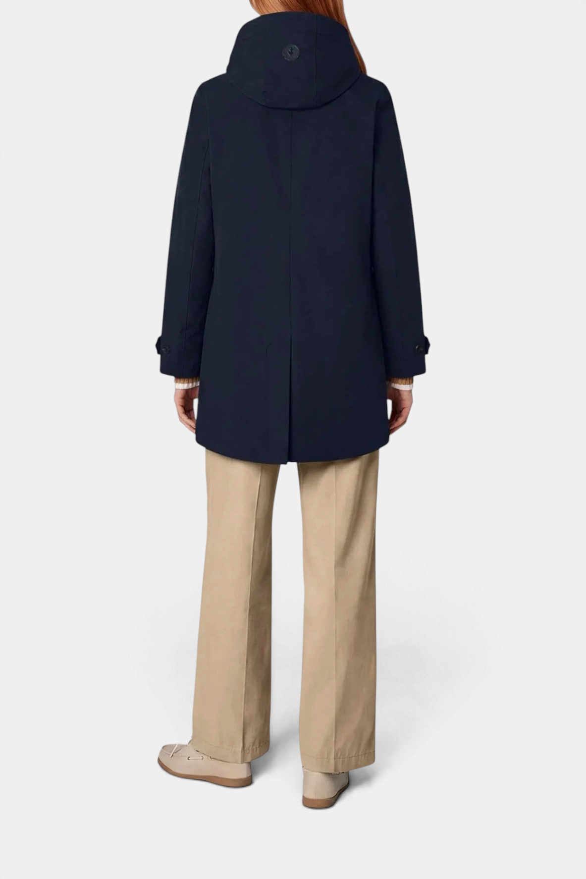 Back view of The Copper Shed Embie navy blue waterproof recycled polyester raincoat with a detachable hood.