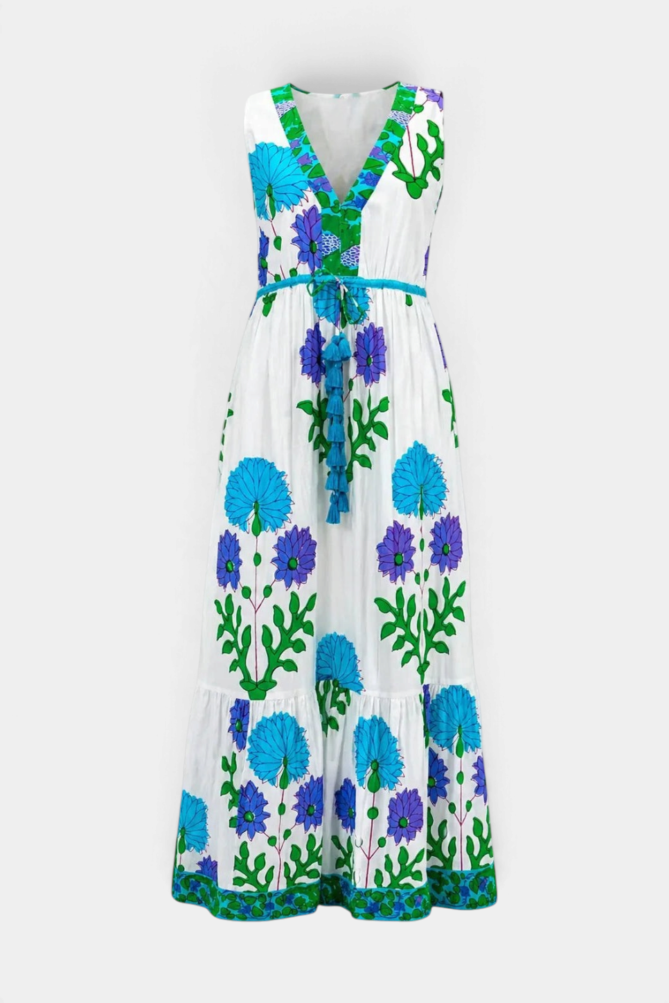The Copper Shed Emily maxi dress in white cotton with blue and purple floral print, sleeveless cut, and waist ties.