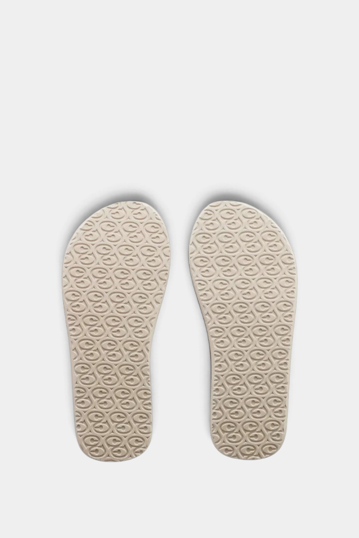 The Copper Shed Floater 2 beach flip flop sandals featuring a soft brushed EVA footbed with a textured logo pattern.