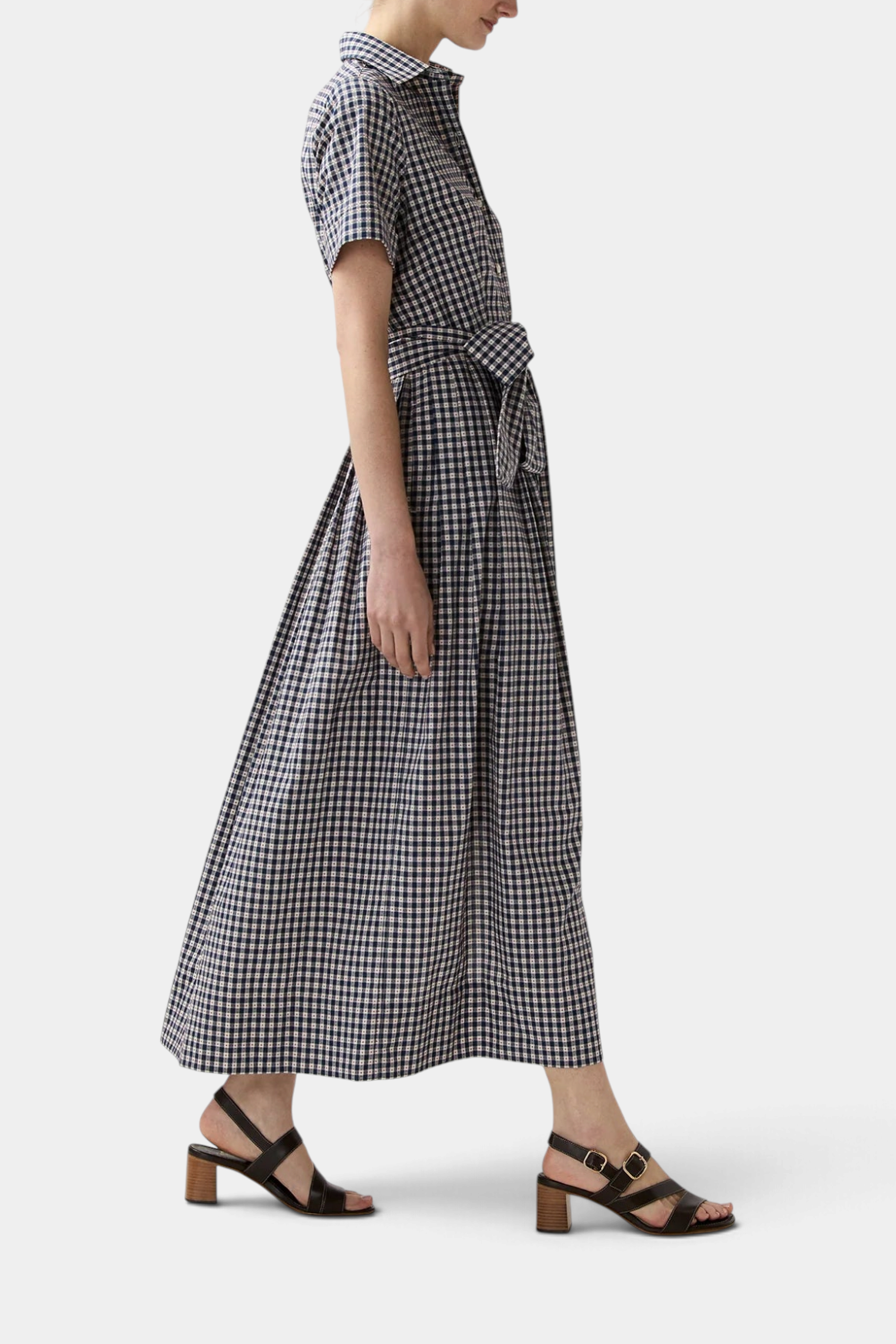 The Copper Shed gingham shirtwaist maxi dress in embroidered Japanese cotton with a self-belt and full pleated skirt.