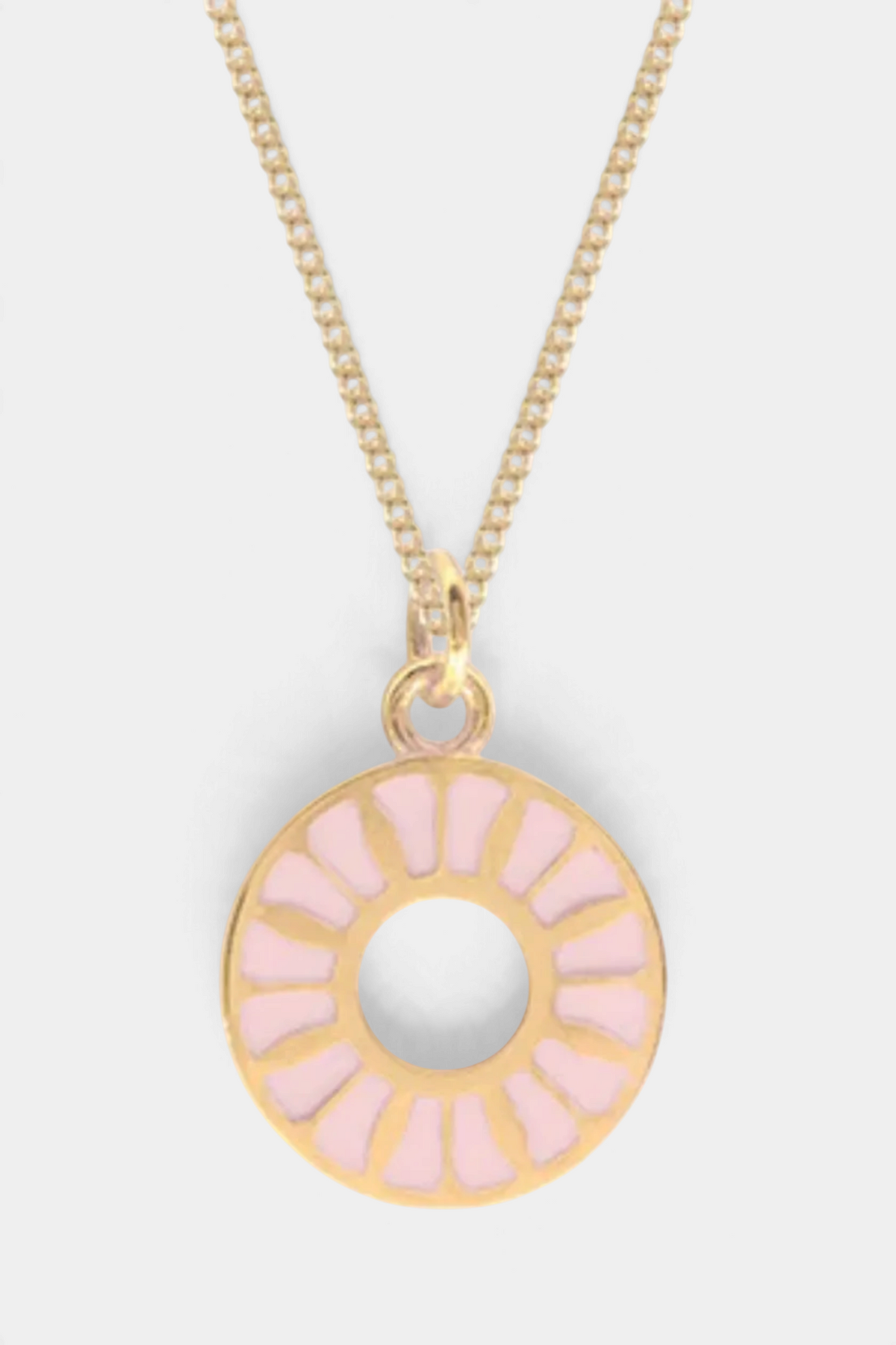 The Copper Shed flower ring enamel necklace featuring a pink enamel circular pendant on a gold vermeil chain.