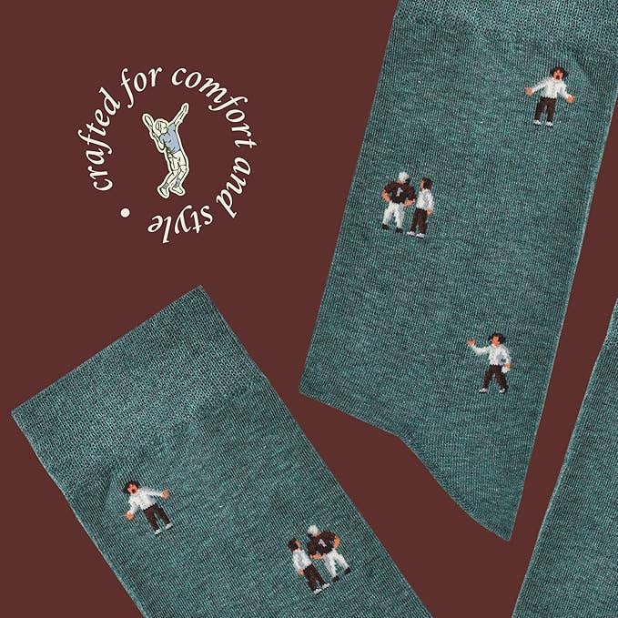 The Copper Shed novelty socks in green cotton featuring detailed knitted coach figures with whistles and clipboards.