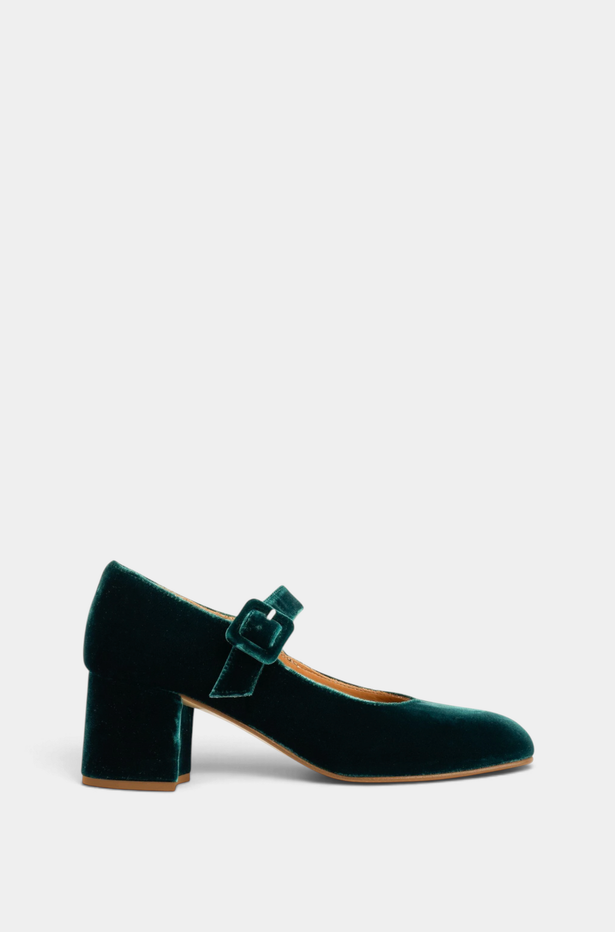 The Copper Shed Honey Velvet Shoe in deep green with a block heel, rounded square toe, and velvet-covered buckle.
