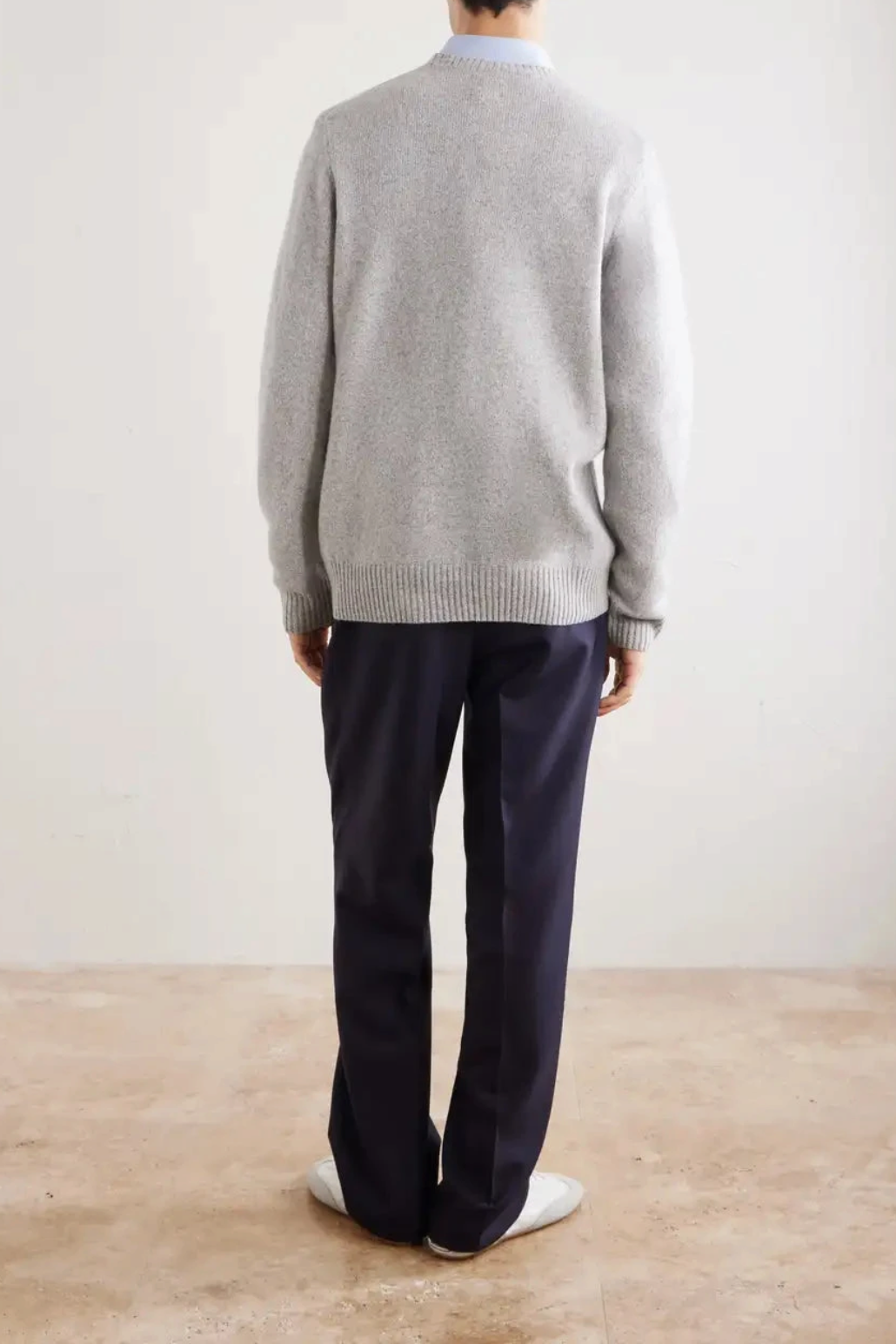The Copper Shed grey merino wool crew neck sweater with ribbed trims, shown from the back on a man.