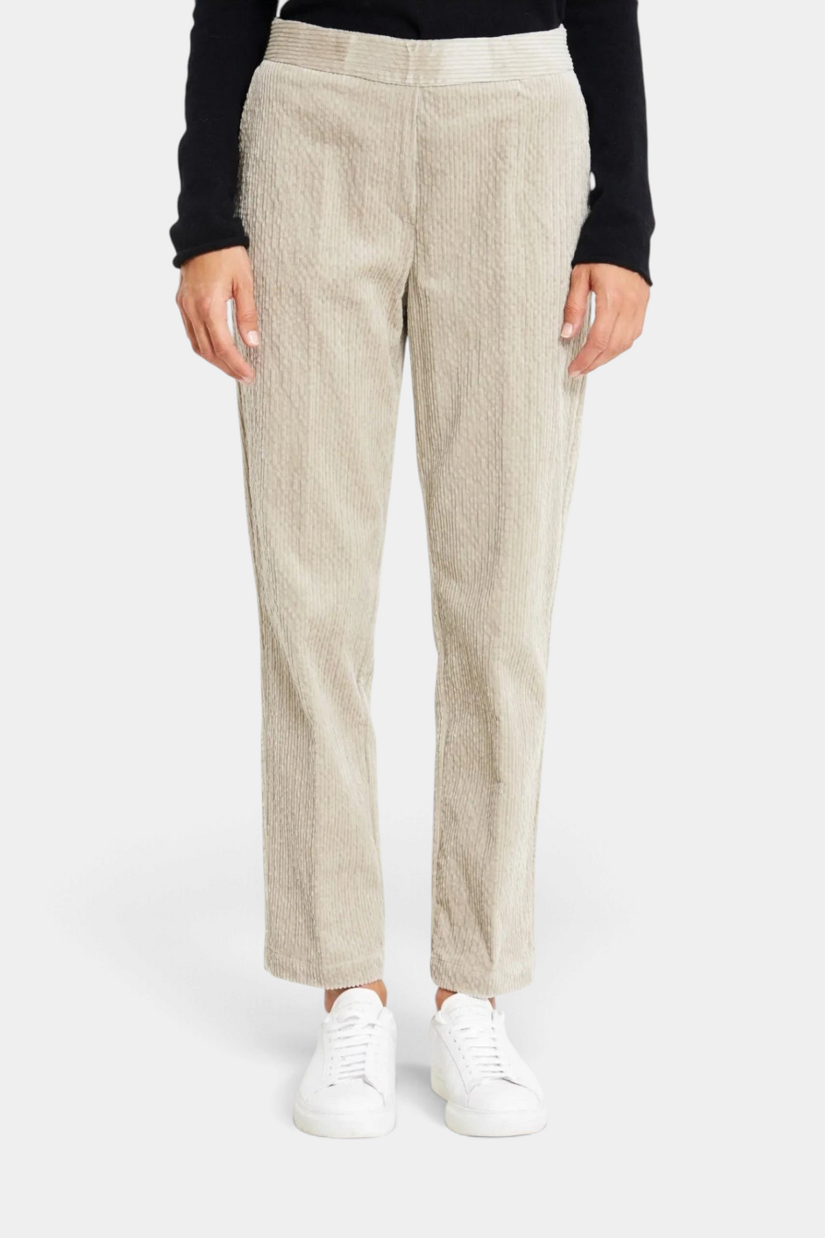 The Copper Shed Haiti cigarette pants in beige stretch cotton modal corduroy with turn-up cuffs and slant pockets.