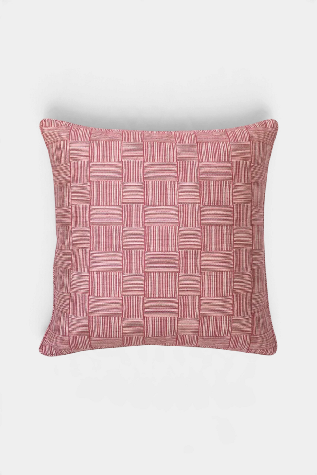 The Copper Shed Susan Deliss Hanim square throw pillow in a red and white woven geometric pattern with self-piping.
