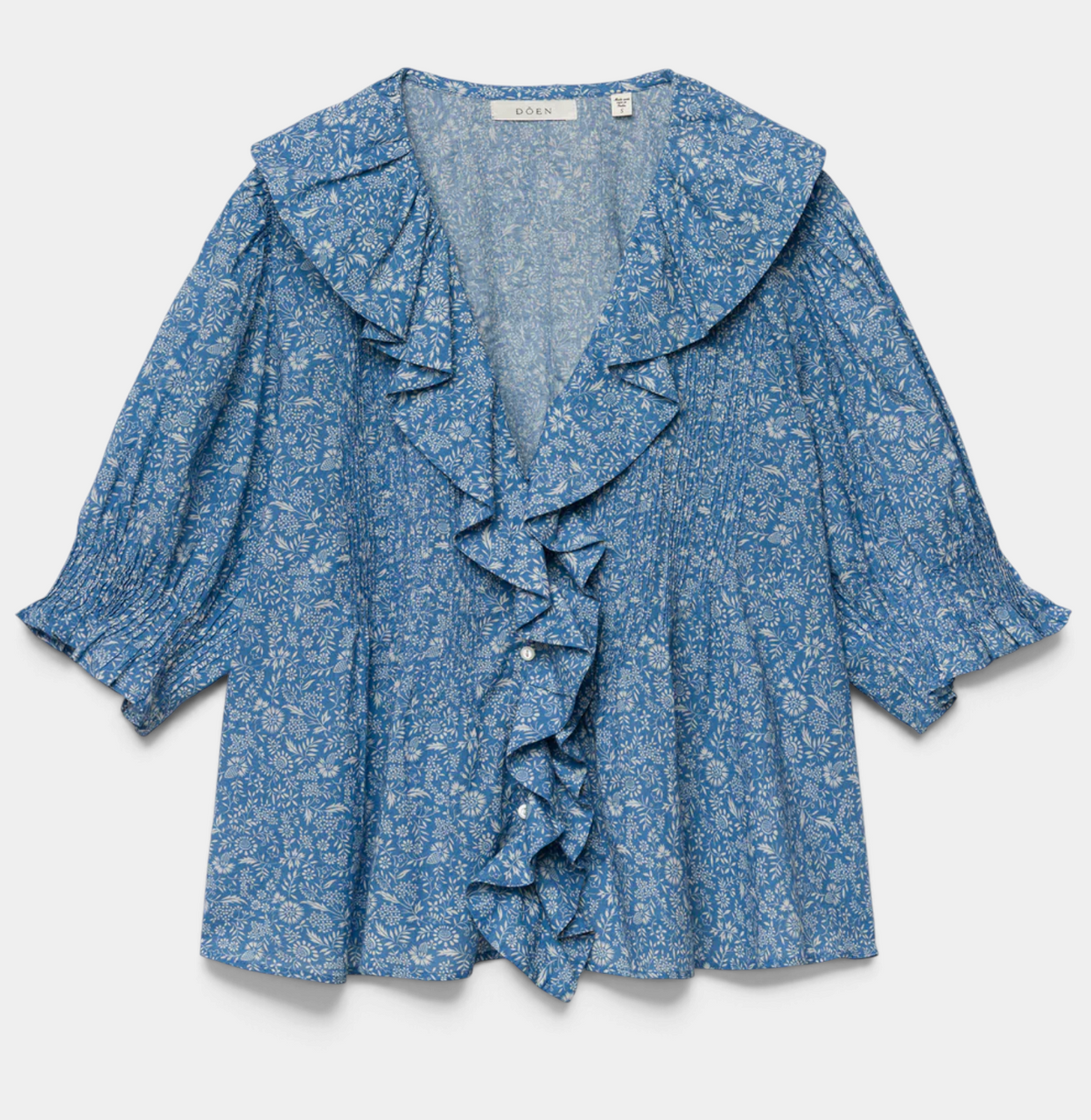 The Copper Shed Henri Top in blue floral organic cotton voile with ruffled collar and puffed sleeves