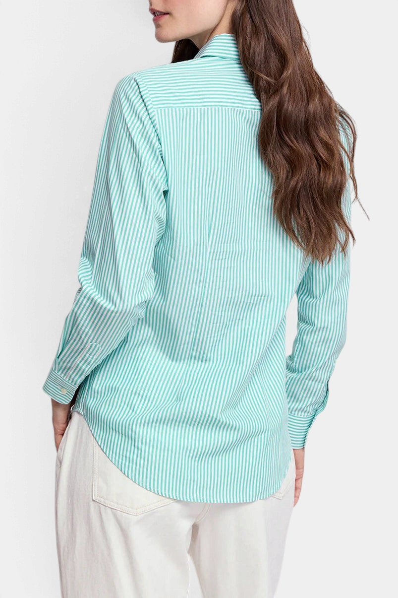 The Copper Shed Icon Shirt in a green and white striped cotton stretch fabric, back view on a model.