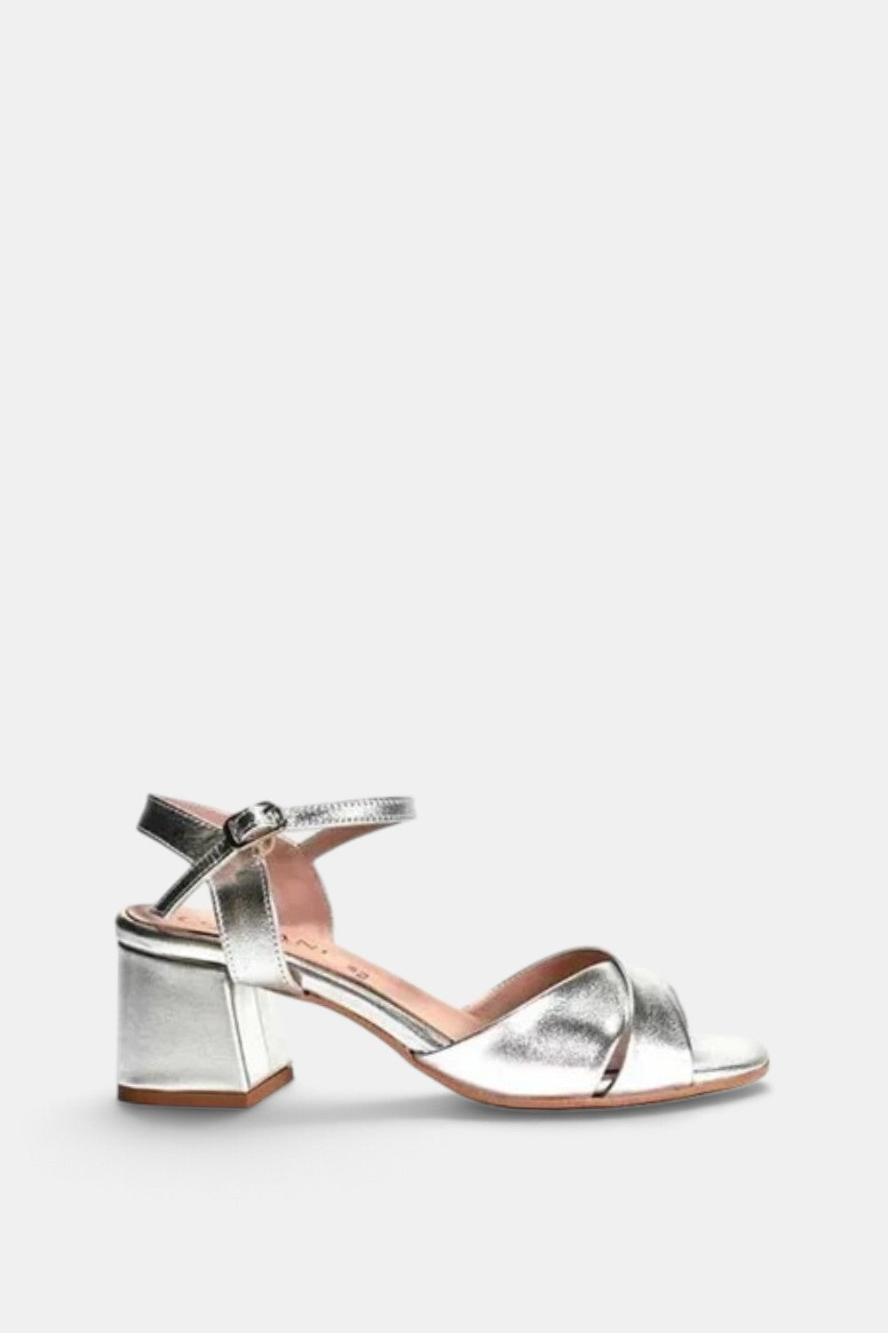 The Copper Shed Ilaria silver leather heeled sandals with criss-cross straps and a 2.5-inch block heel.