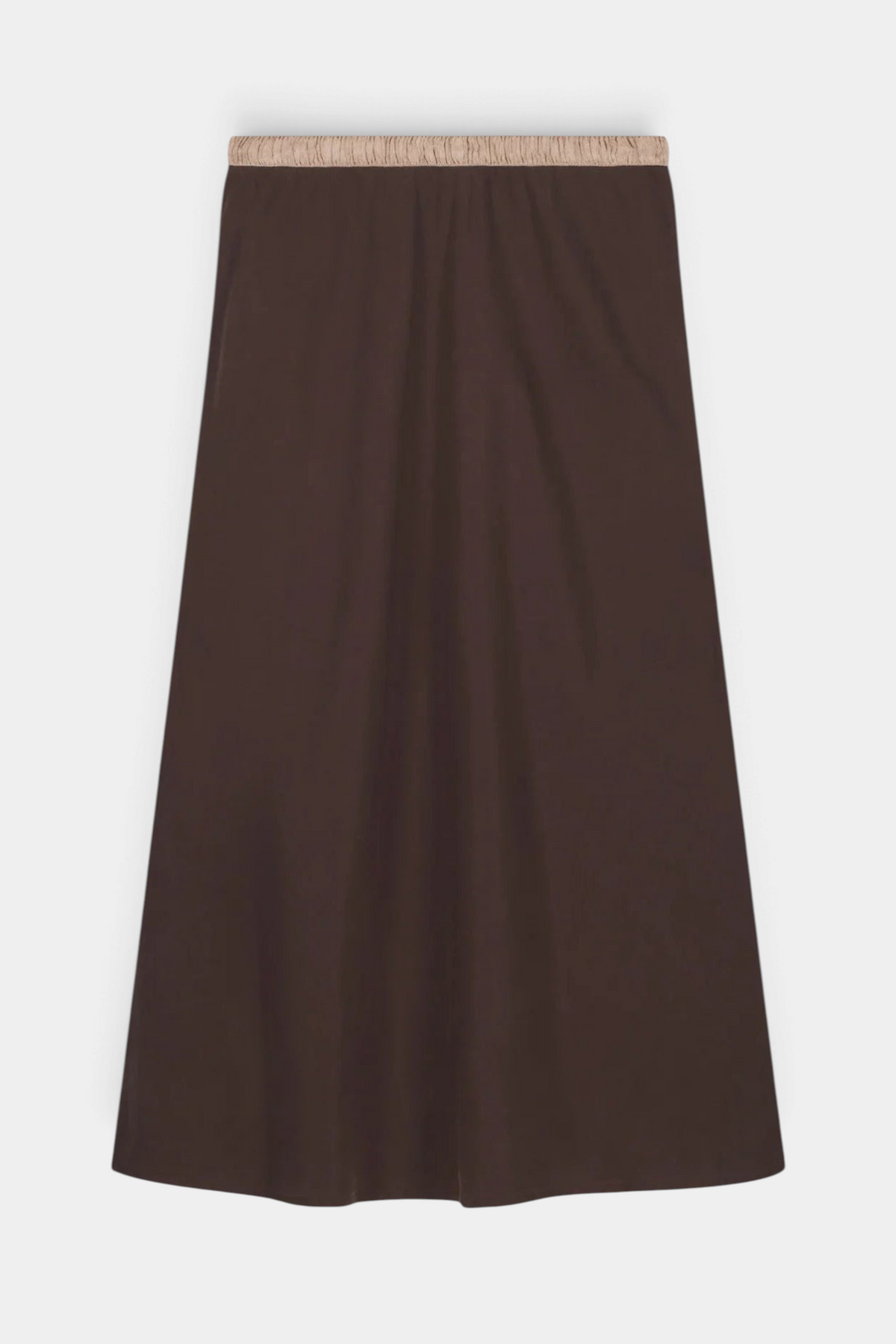 The Copper Shed Jima midi skirt in dark brown lyocell with a fancy lurex elastic waistband and flattering bias cut.