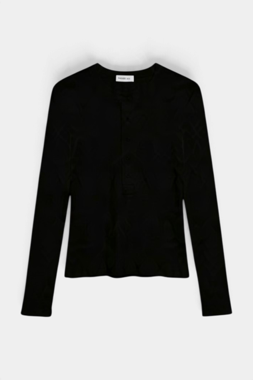 The Copper Shed Kaia long sleeve black henley tee in ribbed cotton jersey with a five-button placket.
