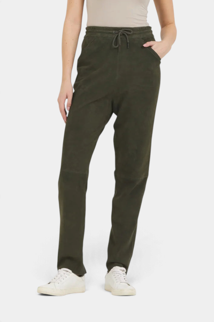 The Copper Shed Kyle jogger pants in dark olive suede with an elastic drawstring waist and slim-fit silhouette.
