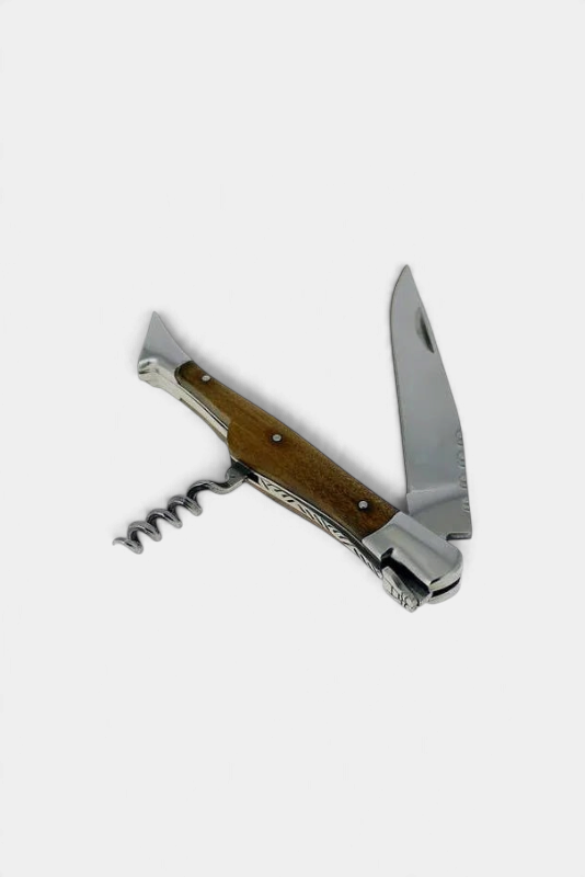 The Copper Shed Laguiole pocket knife with olive wood handle, stainless steel blade, and integrated corkscrew.
