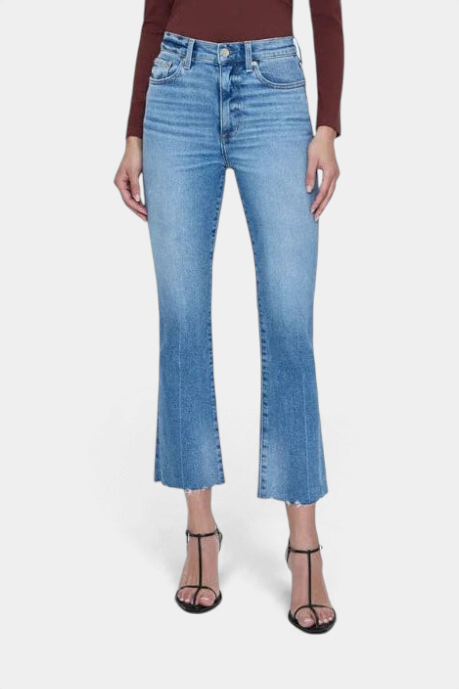 The Copper Shed Lennon high rise crop boot jeans in light wash denim with a frayed hem and boot cut silhouette.