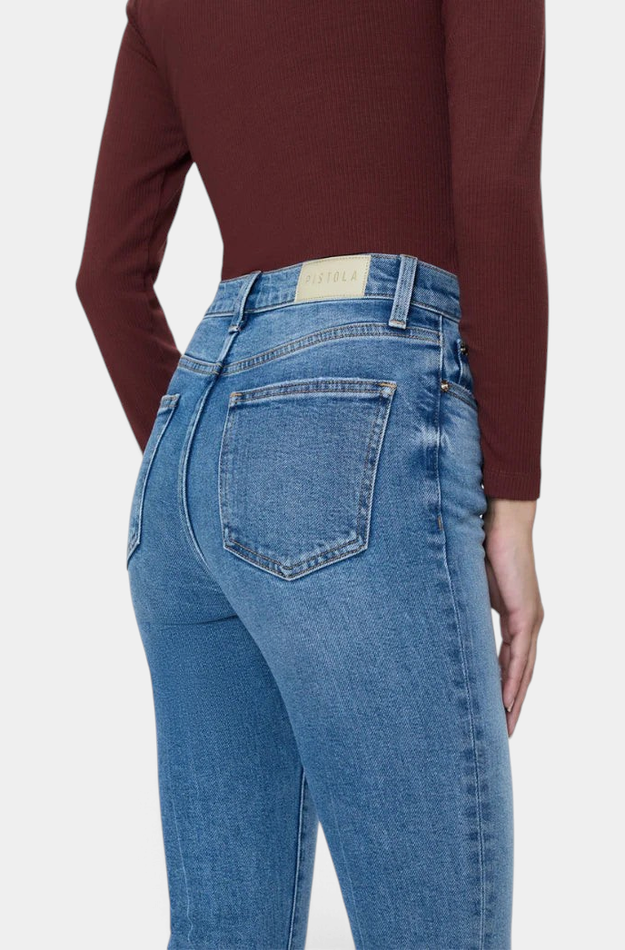 The Copper Shed Lennon high rise crop boot jeans in blue denim with back pockets and a leather brand patch