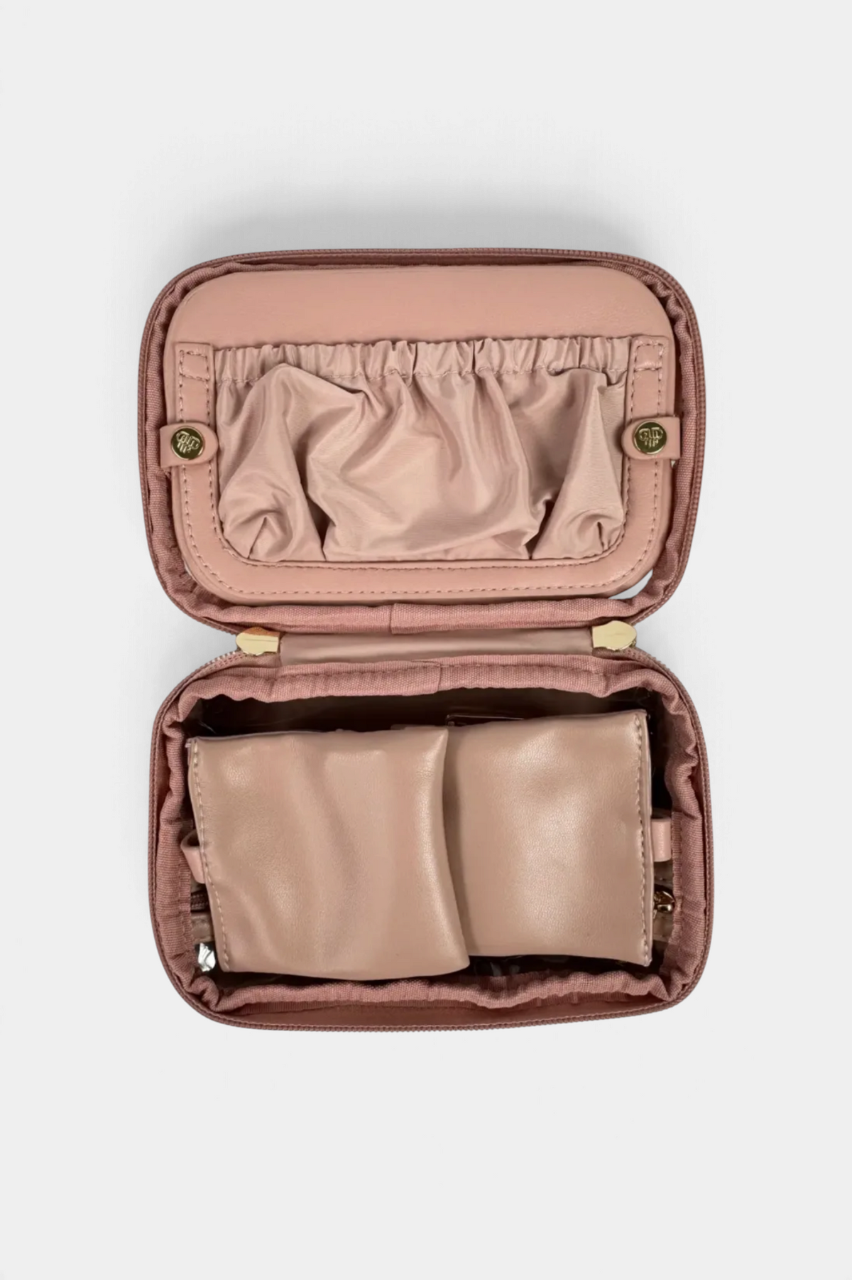 The Copper Shed Littmini lighted mirror case in dusty rose, featuring an open interior with storage pockets.
