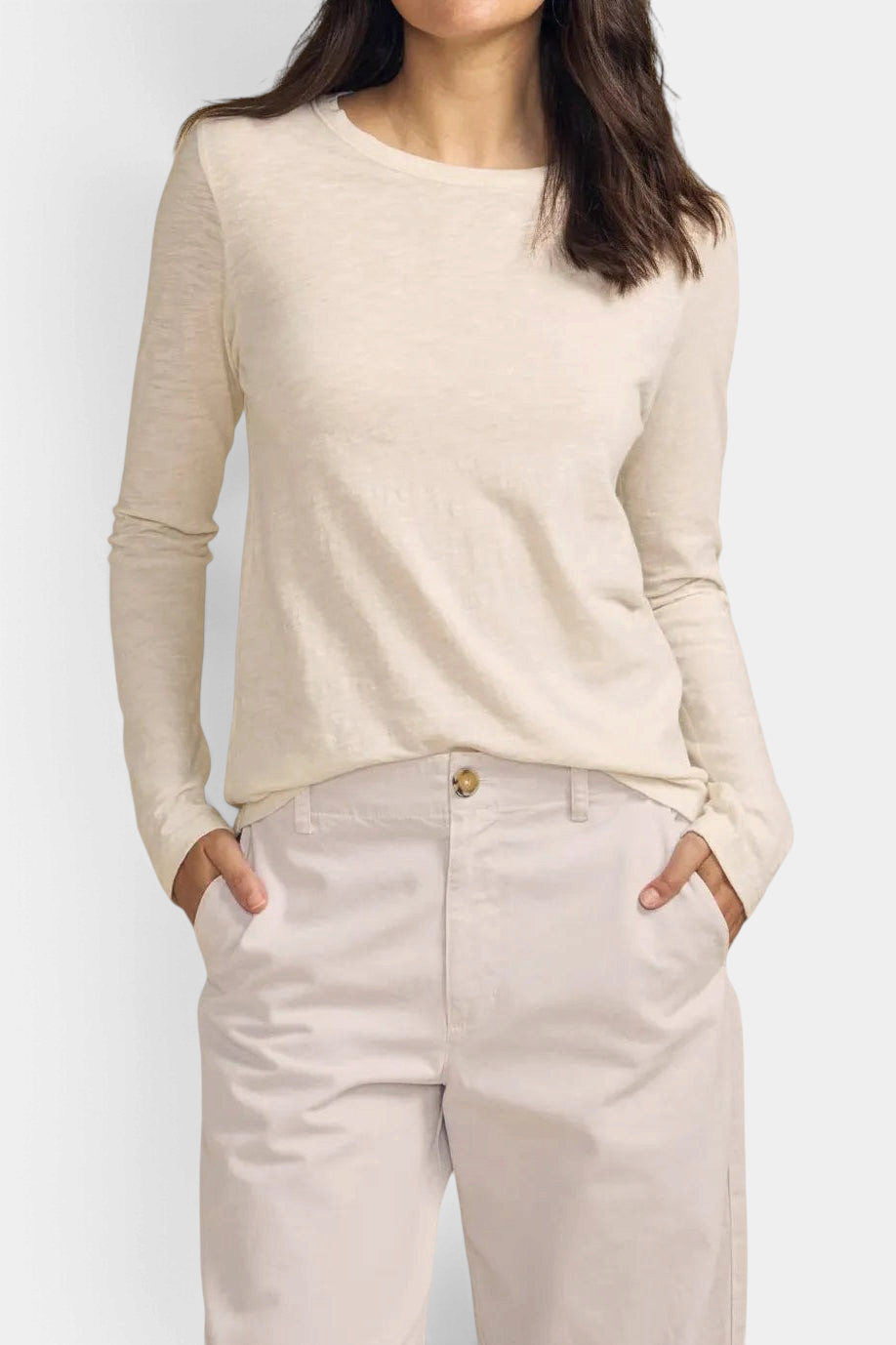 The Copper Shed Lizzie Tee in cream textured cotton slub with long sleeves and a crew neckline on a model