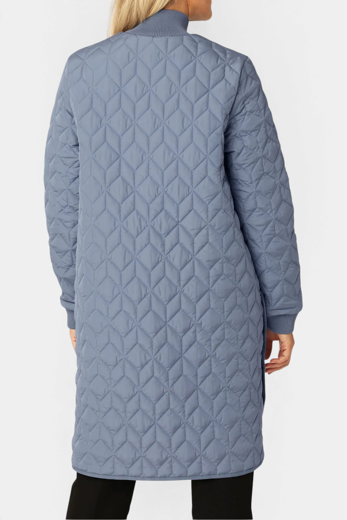 The Copper Shed long blue padded quilt jacket with a high ribbed neckline and diamond pattern, back view.